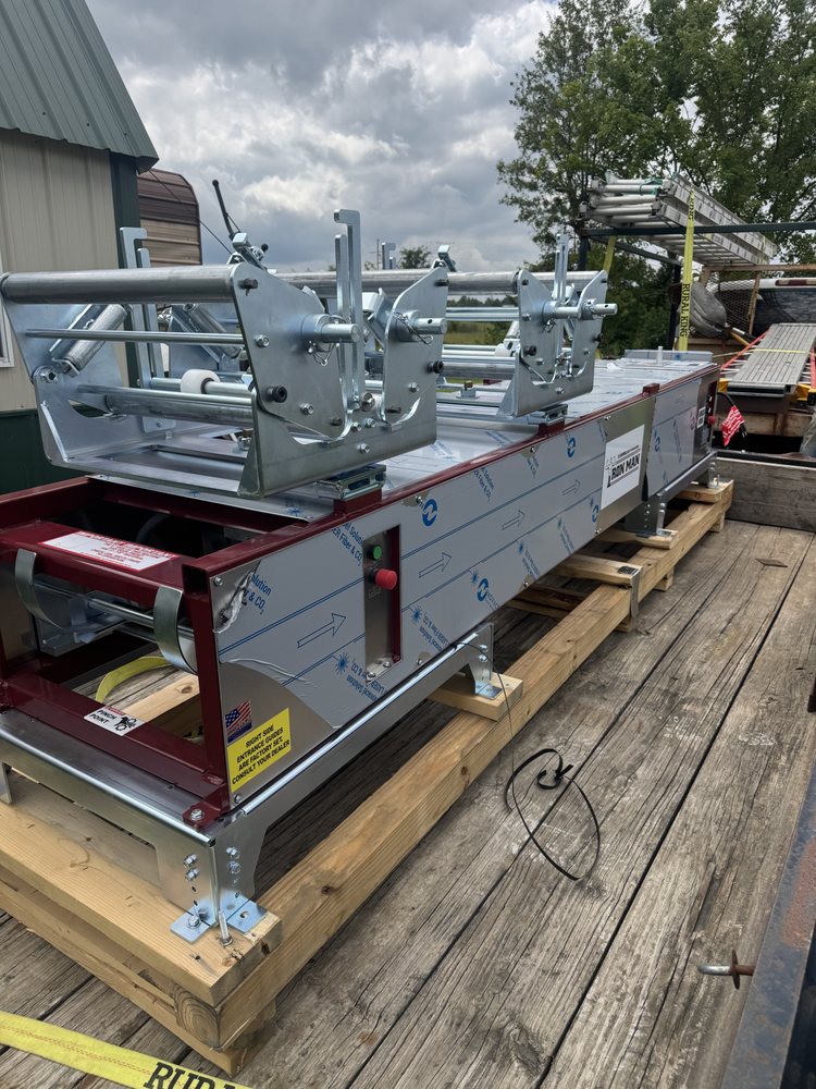 White Oak LLC seamless gutter forming machine on site in Harrisburg, Illinois